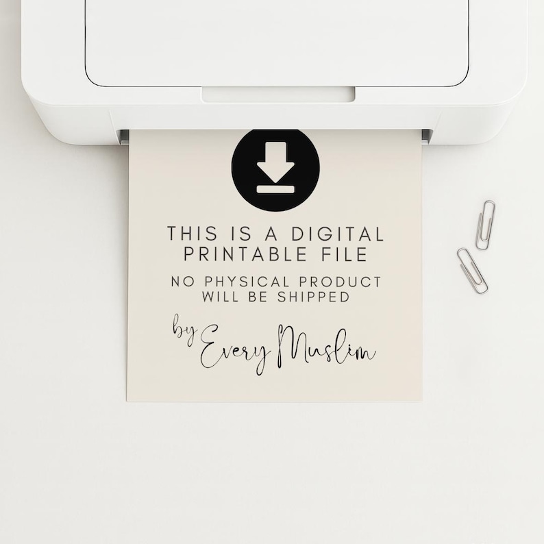 May include: A white printer printing a beige paper with black text and a black download icon. The text reads "THIS IS A DIGITAL PRINTABLE FILE" and "by Every Muslim". Two silver paper clips are visible.