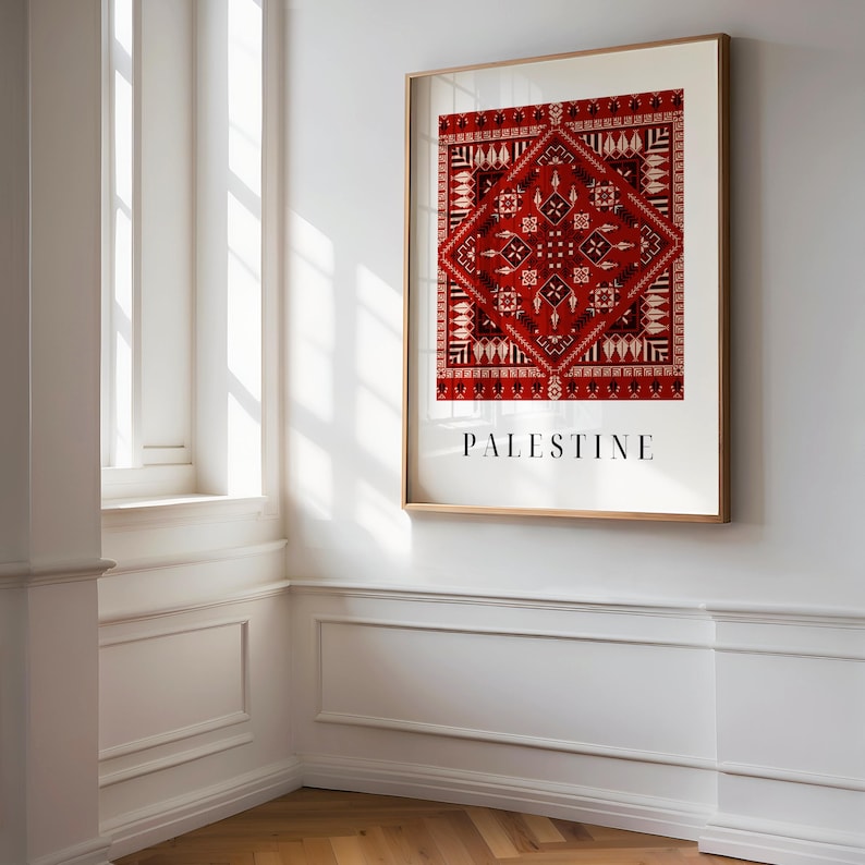 Digital wall art featuring a traditional Palestinian Tatreez embroidery pattern in vibrant red and black. The intricate geometric design symbolizes Palestinian cultural heritage, with the word "Palestine" elegantly displayed below.