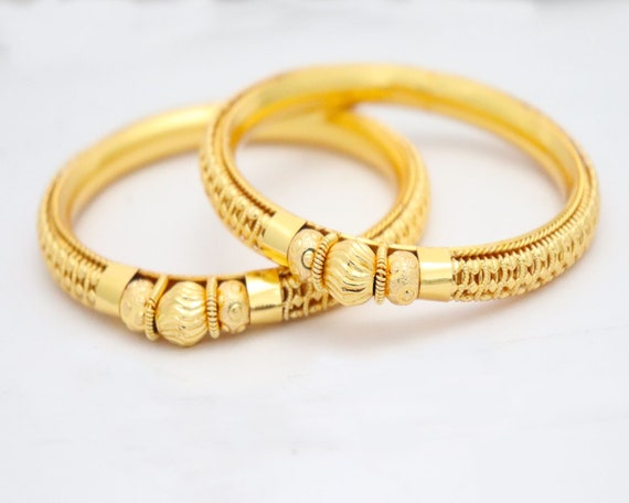 DREAMJWELL - Gold tone Trishul designer men's bracelet dj-34921 – dreamjwell