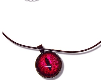 Red, pink, and silver hand painted dragon's eye necklace on a 16-inch black cord.