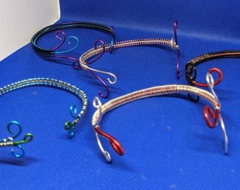 Wire weaved arm bands in fun color combos