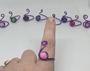 Adjustable size ring wire wrapped purple with 8 mm hand painted glass