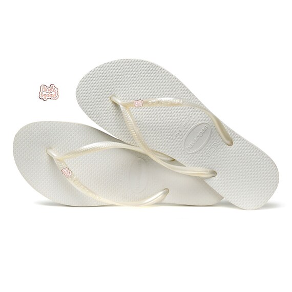 havaianas flip flops white and gold