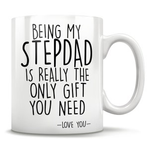 May include: White ceramic mug with black text that reads "Being my stepdad is really the only gift you need - Love you -"