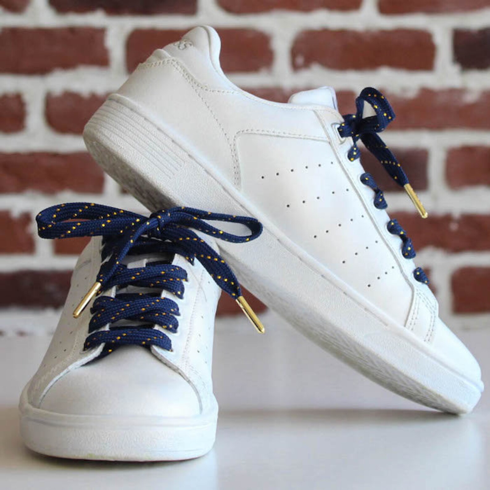 navy blue and gold shoes