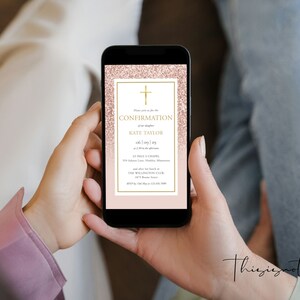 May include: A smartphone displays a Confirmation invitation. The design features a gold cross, text, and a pink glitter background. The invitation includes the name Kate Taylor and event details.