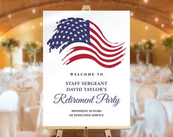 May include: A white sign on a wooden easel featuring an American flag design. The sign says "Welcome to Staff Sergeant David Taylor's Retirement Party" and "Honoring 30 Years of Dedicated Service."