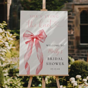 Modello di cartello di benvenuto per addio al nubilato &quot;She&#39;s Tying the Knot&quot;, decorazione per addio al nubilato con fiocco rosa, modello modificabile, download immediato