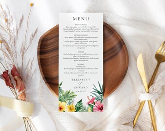 May include: A wedding menu card with a tropical floral design featuring hibiscus and palm leaves. The menu lists courses like soup, salad, and cake. The names Elizabeth and Edward are printed at the bottom, along with the date 09.15.XX.
