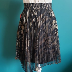 DEADSTOCK 70s pleated metallic skirt, zebra print, black and gold, size xs, size small, accordion pleats, asymmetrical skirt, new with tags