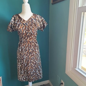 Size small/ 1960s wiggle dress, animal print, cheetah print, vintage dress, pinup, rockabilly, pencil dress, cocktail dress, sexy, vamp