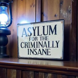 Asylum  Criminally Insane Metal Wall Sign: Gothic Horror Decor