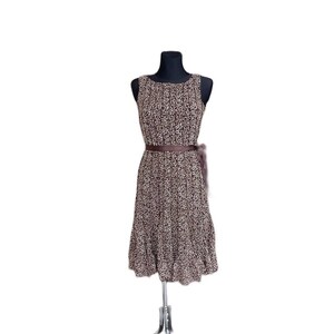 Vintage womens dress 60s-inspired brown dress with modern twist vertical stripes and artistic design elements size 6