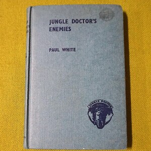 Djungeldoktorns fiender av Paul White - Djungeldoktorns serie, nr 5 - Australiensisk missionärsförfattare - 1960 vintage inbunden