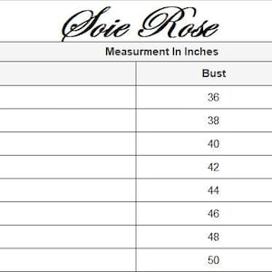 May include: A black and white size chart for Soie Rose model SR-1012, displaying measurements in inches. The table lists sizes from XS to 4XL, with bust measurements ranging from 36 to 50 inches and a consistent length of 36 inches for all sizes.