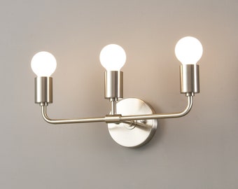Aplique de pared de níquel cepillado de 3 luces - Iluminación moderna y minimalista para baño, tocador o pasillo - Lámpara de pared industrial con bombilla expuesta