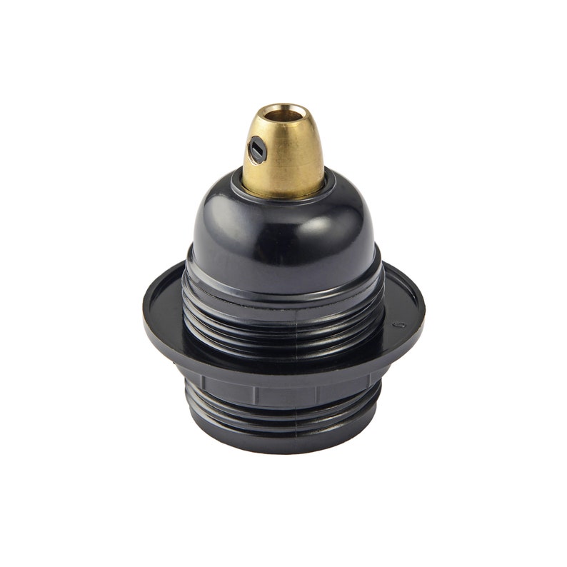 May include: Black bakelite lamp socket with a brass center contact. The socket has a threaded base and a threaded top for attaching a light bulb.