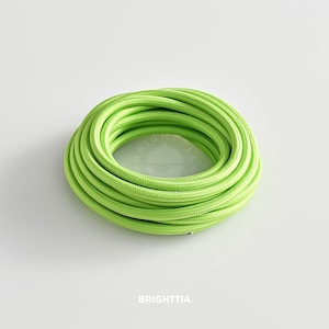 Puede incluir: Un rollo de cable eléctrico verde brillante, perfecto para añadir un toque de color a tus proyectos de decoración del hogar.