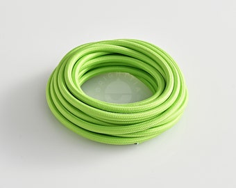 May include: A coil of bright green electrical cord, ideal for adding a splash of colour to your home decor projects.