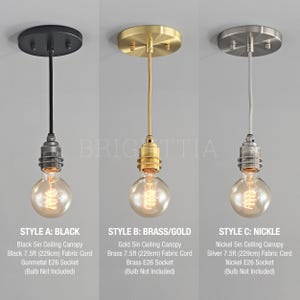 May include: Three pendant lights with different finishes: black, brass/gold, and nickel. Each features a round ceiling canopy, fabric cord, and an Edison-style bulb. The text on the image provides details about the style and components.