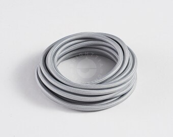 May include: A coil of silver electrical cable, ideal for adding a contemporary feel to your home decor projects.
