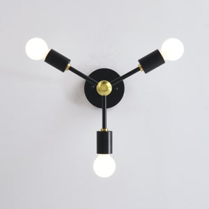 3-Light Semi Flush Ceiling Light - Black & Gold - Industrial Modern Minimalist Sputnik Chandelier Lighting - Mid Century Exposed Bulb Lamp - Image showing ceiling lamp mounted on ceiling with lights on viewed from direct below - Brighttia.etsy.com