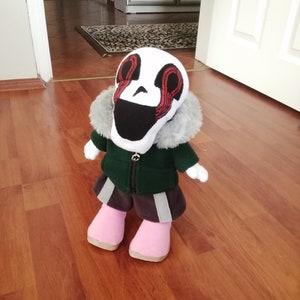 VHS Sans plush toy. All parts of the doll's clothes are removable, arms, legs and head are movable. Doll size: 35cm. ( 14 inch )