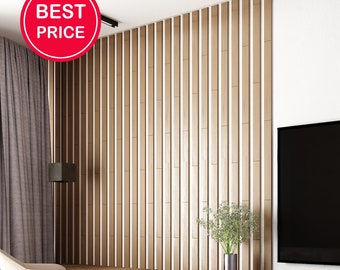 May include: A modern living room interior with a wooden wall panel, a black television, a floating shelf, and a black and white chair. The room has a wooden floor and a grey rug.