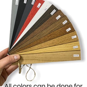 The photo shows colors of wood for wood wall slats :natural oak, yellow oak, oil oak, walnut, rosewood, white, wenge, red.