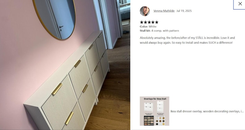 May include: White shoe storage cabinet with gold handles and a textured front panel. The cabinet is mounted on a pink wall, with a gold-framed mirror above. The cabinet has multiple compartments.