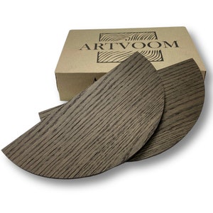 May include: Two half-circle wooden shelves in a dark gray wood stain. The shelves are made of real wood and have a natural grain pattern. The shelves are packaged in a brown cardboard box with the word "ARTVOOM" printed on the top.