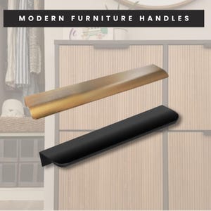 May include: Two modern furniture handles are displayed. One is gold-toned, the other is black. The handles are rectangular with a curved edge. The text "MODERN FURNITURE HANDLES" is at the top of the image.
