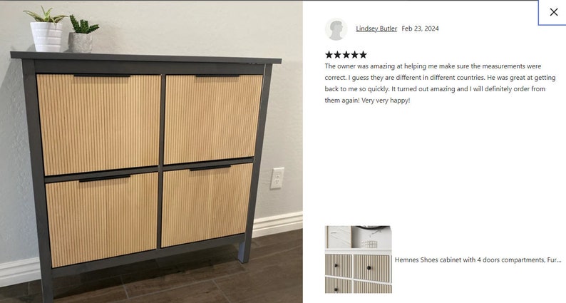 May include: A gray shoe cabinet with four doors. The doors have a vertical, ribbed design in a light wood color. The cabinet has a dark gray frame and black handles. Two small potted plants sit on top.