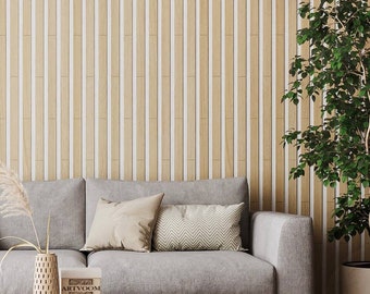 May include: A grey sofa with two cushions, a black coffee table, a vase with dried flowers, and a book with the text "ARTVOOM" on a wooden floor with a wood panel wall behind the sofa.