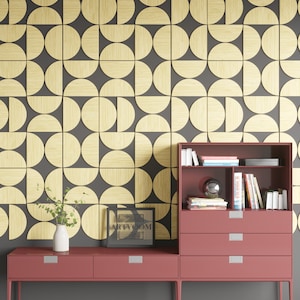 May include: A red wooden cabinet with three drawers and open shelves. The cabinet is decorated with a geometric pattern of half circles in wood tones. The cabinet is next to a red wooden media console with two drawers. A black framed print with the text "ARTVOOM" is on top of the console.