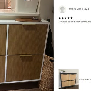 May include: A white and wood-tone shoe cabinet with four doors and gold-colored handles. The cabinet has a white frame and a light brown, vertically-lined texture on the doors. The cabinet is a furniture overlay for Hemnes Shoes cabinet.