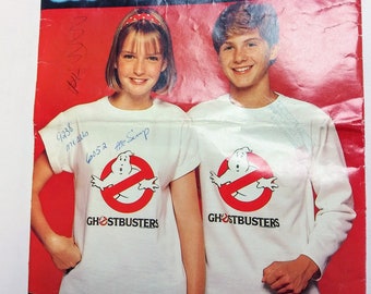 Girls' and Boys' t shirt pattern with 1 Ghostbusters irons on transfer, Butterick 996, Chest 26"- 32"