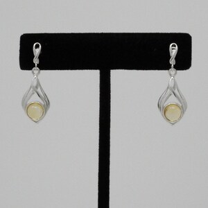 Conjunto de brincos citrinos em prata esterlina