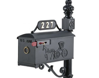 May include: Black mailbox with a horse-drawn carriage design and a black post with a decorative finial. The mailbox has a red "U.S. Mail" label and a brass ring. The address number "227" is displayed on the mailbox.