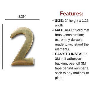 May include: Gold metal house number "2" with a self-adhesive backing. The number is 2 inches tall and 1.25 inches wide.