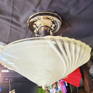 Vintage Ceiling Light shade featuring clear and frosted white glass. Glass finish has some irregularities.New fixture in chrome or white