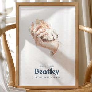 May include: A white ceramic mug with a black handle and the text "But First, Coffee" in a black, handwritten-style font. The mug is on a white surface.