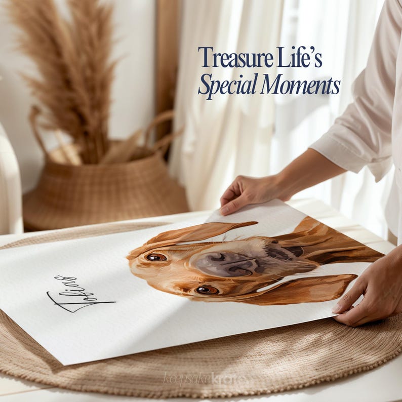 May include: A watercolor portrait of a dog with brown and tan fur, with the name "Tobias" in cursive. The artwork is being held up, with the text "Treasure Life's Special Moments" in the background.