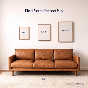 May include: Three framed art prints in sizes 8x10", 12x16", and 18x24" are displayed above a brown leather sofa. The sofa is 82" long and sits on a light-colored rug. The text "Find Your Perfect Size" is at the top.