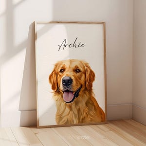 May include: A framed portrait of a Golden Retriever dog named Archie. The dog has a light brown coat, a black nose, and a pink tongue. The portrait is in a wooden frame and is leaning against a wall.
