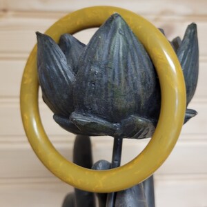 Vintage plastic bakelite green with yellow swirl bangle