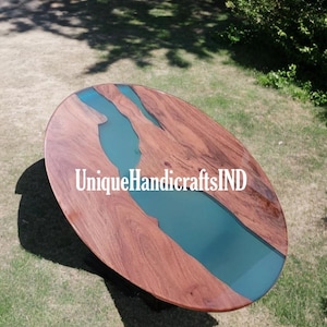 Handmade Oval Coffee Table: Rustic Wood & Blue Epoxy Resin