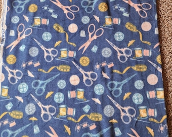 Sewing Notions Anti-Pill Fleece Fabric: Dark Blue, Multi-Colored Scissors, Thread, Thimbles, Needles, and Bobbins. (1.4 Yards)