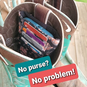 Cartera para teléfono en el maletero: se sujeta con clips dentro del maletero