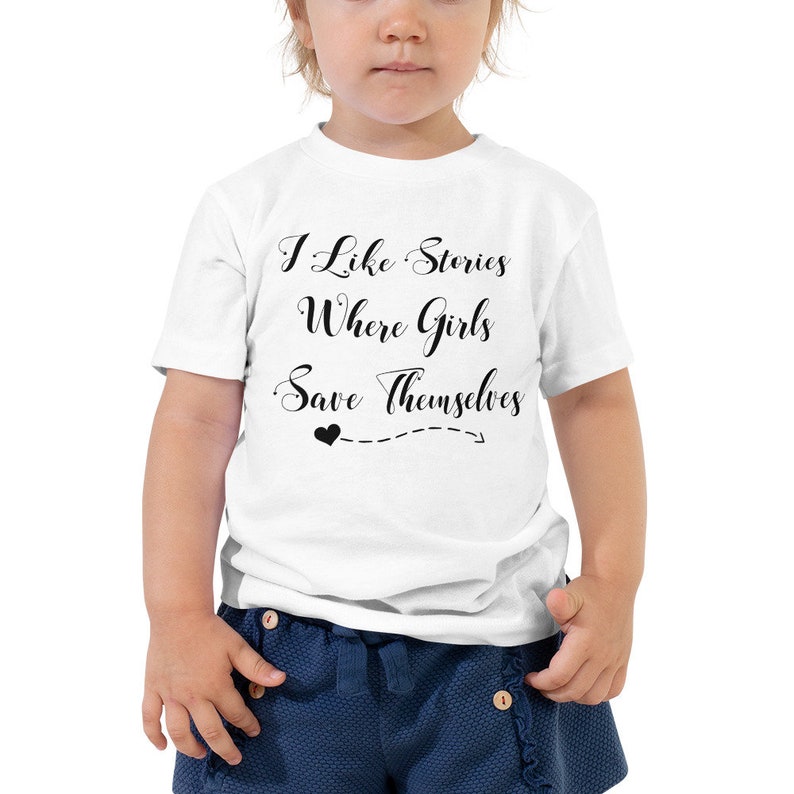 I Like Stories Where Girls Save Themselves Toddler Short Sleeve Tee